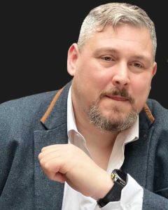 Alisdair Mann's profile headshot